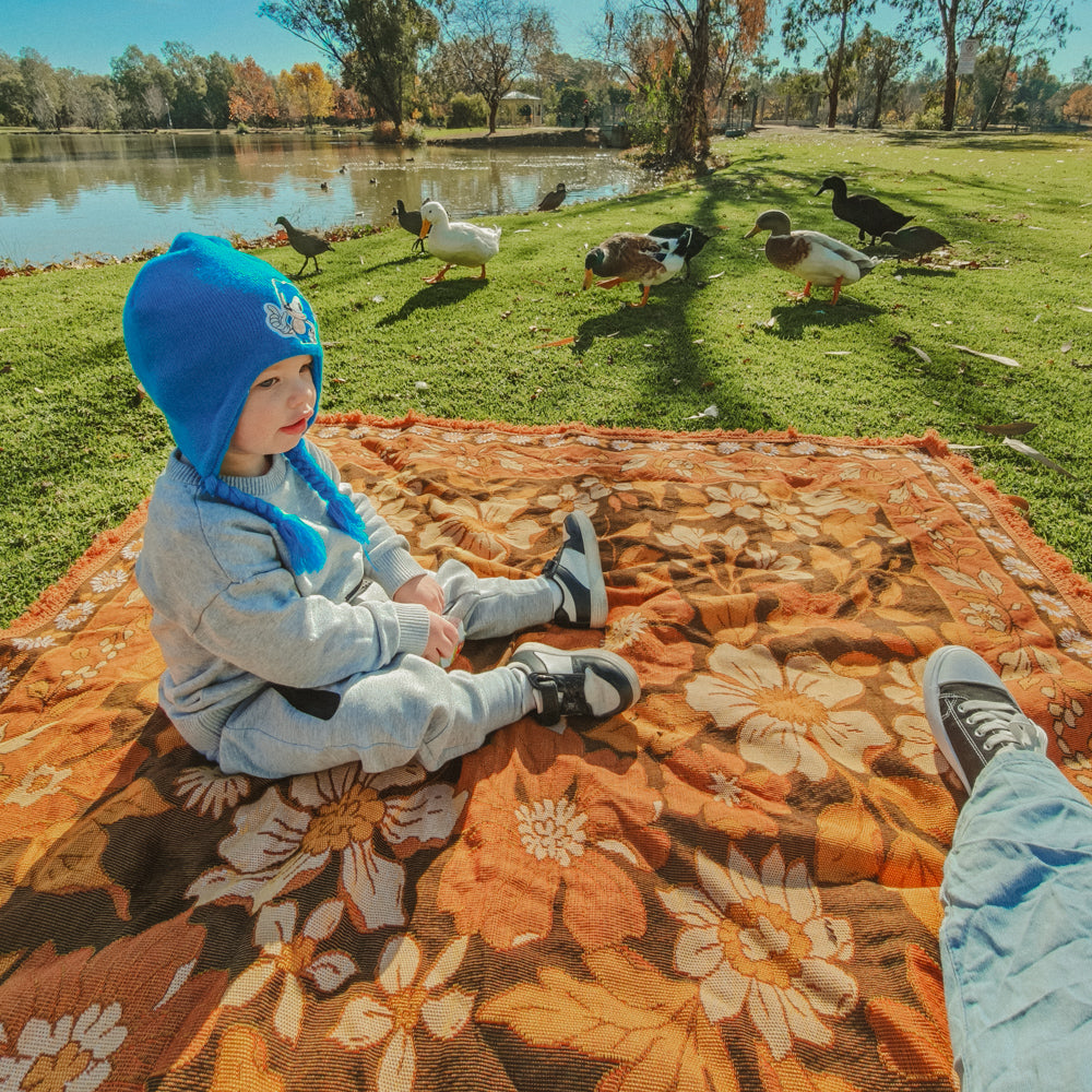 Can Outdoor Picnic Rugs Be Used on Grass or Sand?
